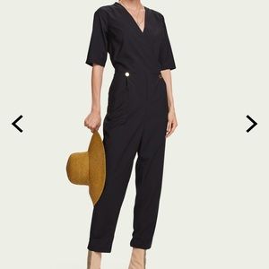 NWT. Size XS. Model is 5'10” and wears size S.